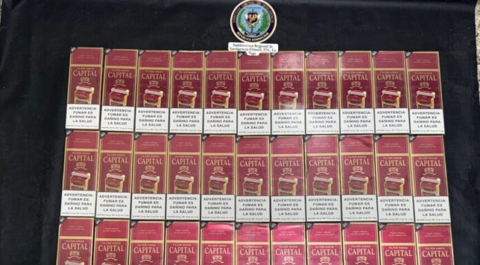 Policía y MP ocupan miles de cigarrillos ilícitos durante allanamientos en La Vega